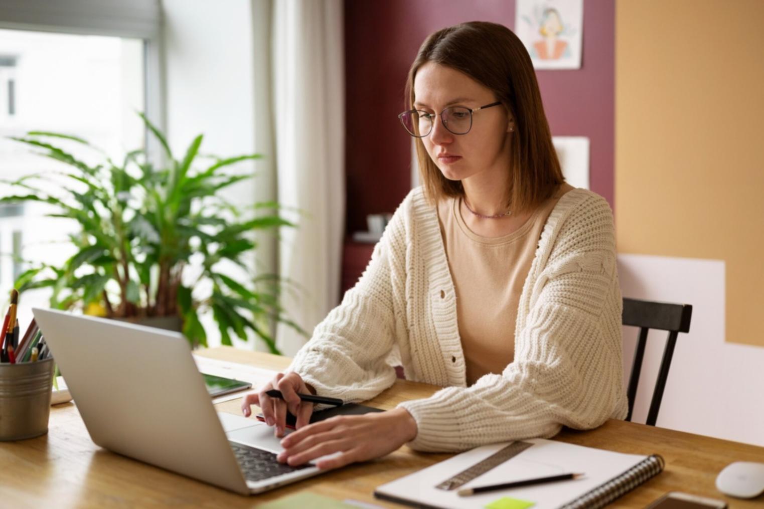 Professional workspace with financial planning materials and modern technology